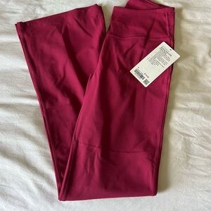 Magenta/pink lululemon flare leggings